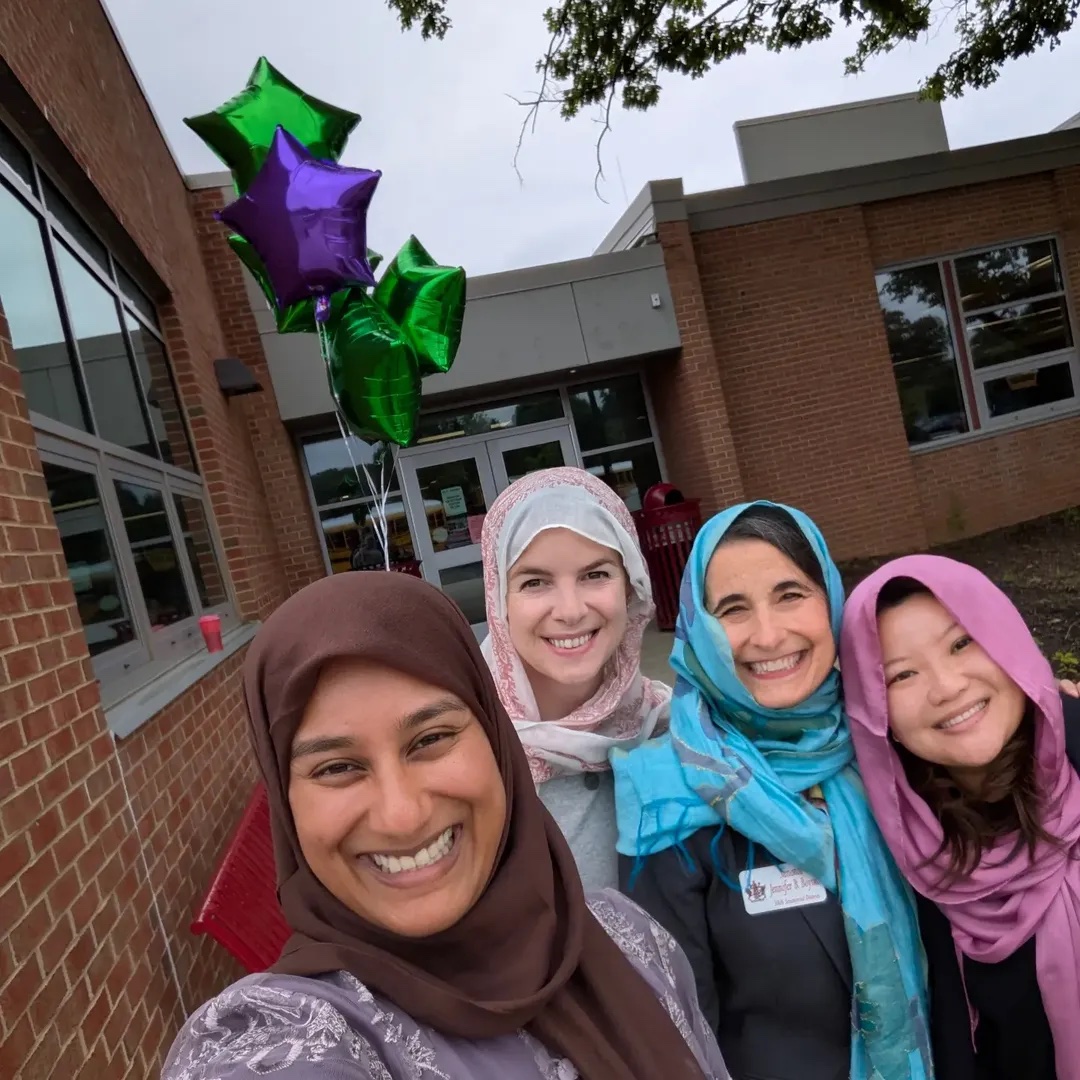 Yasmin Shafiq and fellow legislators taking a selfie with balloons on the campaign trail